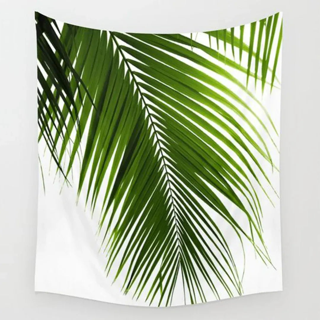 White tapestry printed with large green palm leaves.