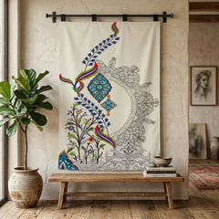 a decorative design printed on a fabric hanging with 4 hanging strips on a hanging rod 