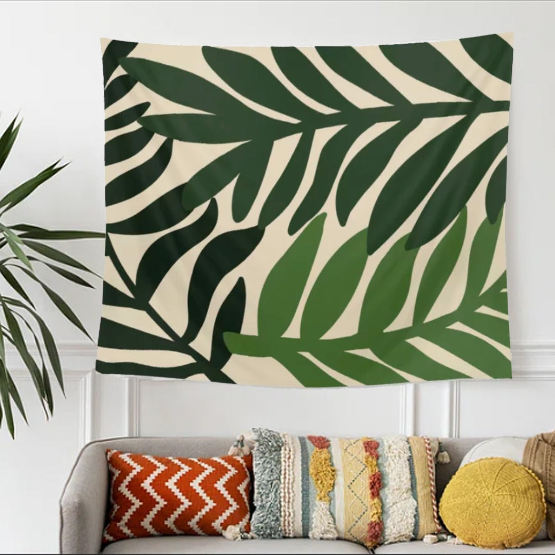 Cream tapestry with large dark green tropical leaves.
