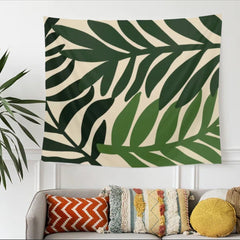 Cream tapestry with large dark green tropical leaves.