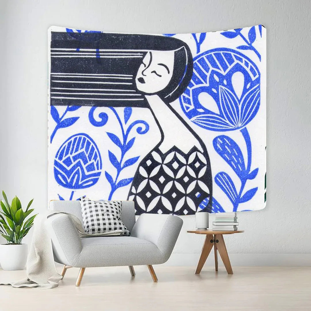 Blue and white tapestry with a stylised woman and floral motifs.